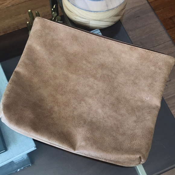 Free People Handbags - FREE PEOPLE Faux Leather Travel Clutch